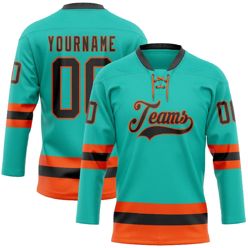 Hockey jersey with contrast piping for a stylish look-Custom Aqua Black-Orange Hockey Lace Neck Jersey